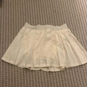 Gold hinge yellow pleated skort yellow
